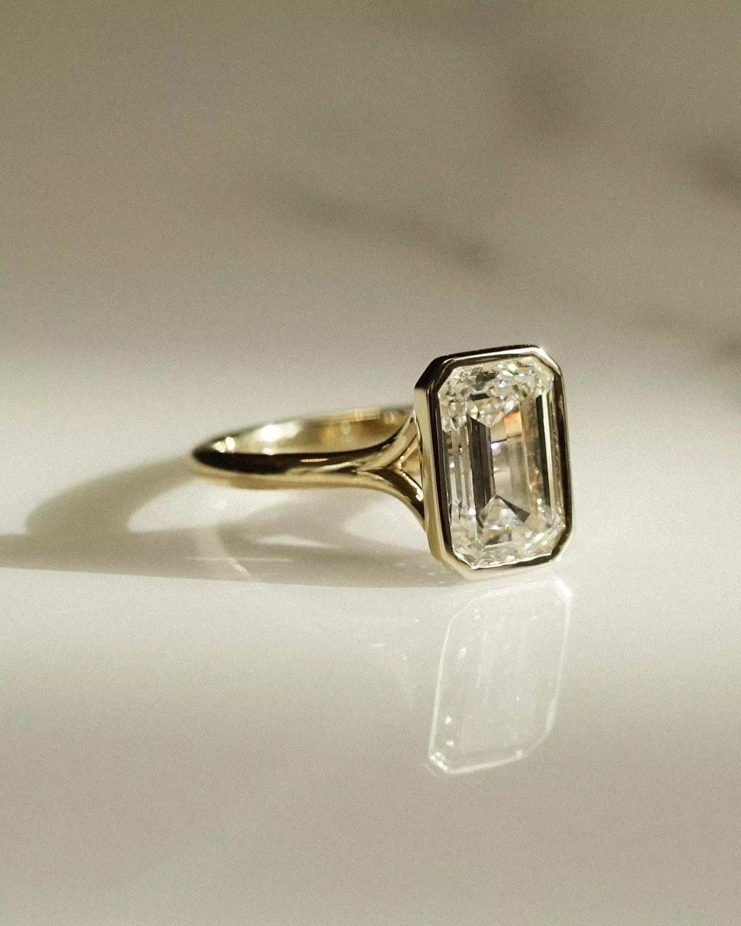 2 Carat Emerald Cut Lab Grown Diamond Ring: 14k Yellow Gold Bezel Set
