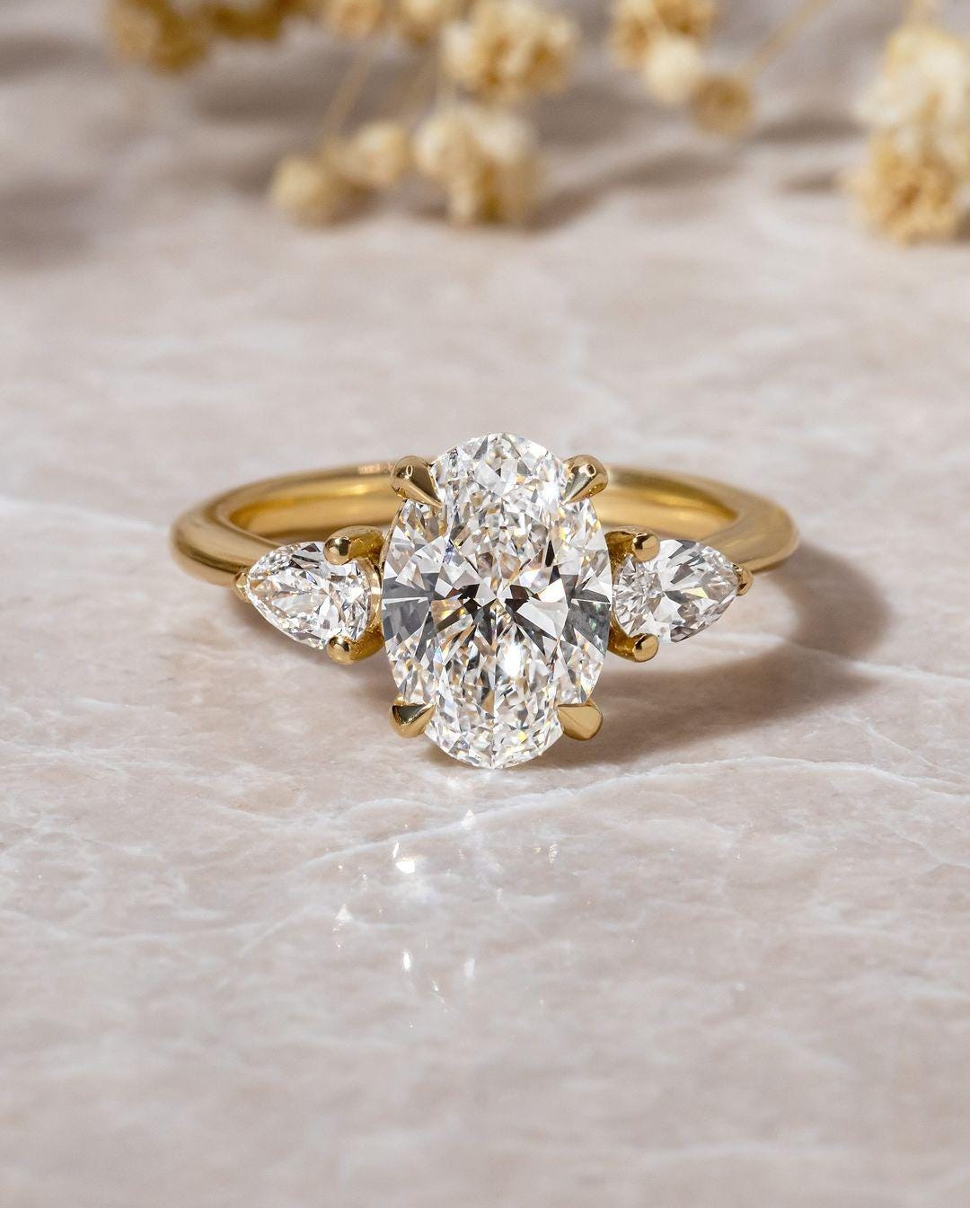 Lab Grown Oval Diamond Trilogy Ring: 14k Gold Pear Side Stones