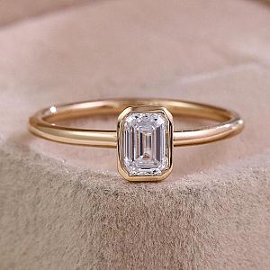 1.50 Carat Emerald Cut Lab Grown Diamond Engagement Ring: 14k Yellow Gold Bezel Solitaire - Image 1