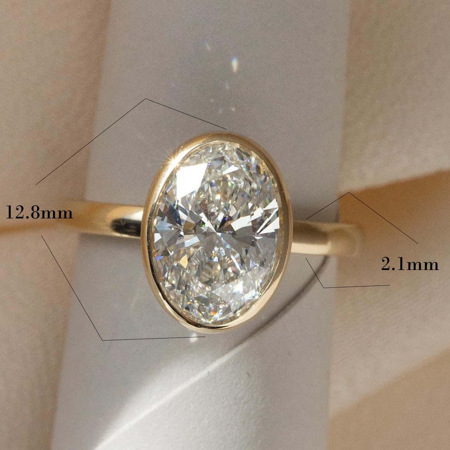 Oval Lab Grown Diamond Ring: 14K Gold Bezel Solitaire, IGI Certified